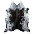 Schwarz-weißes Kuhfell, ca. 180 × 150 cm, von oben fotografiert: genau das Fell, das Sie erhalten