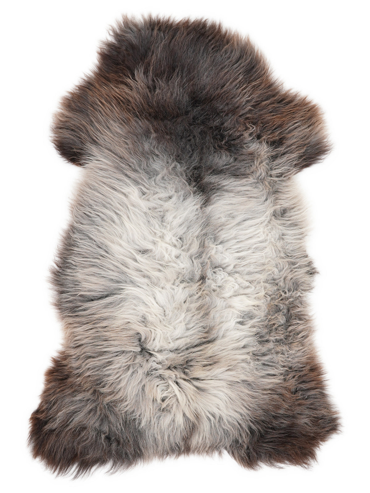 Mehrfarbiges britisches Lammfell, ca. 120 × 65 cm, von oben fotografiert: genau das Fell, das Sie erhalten