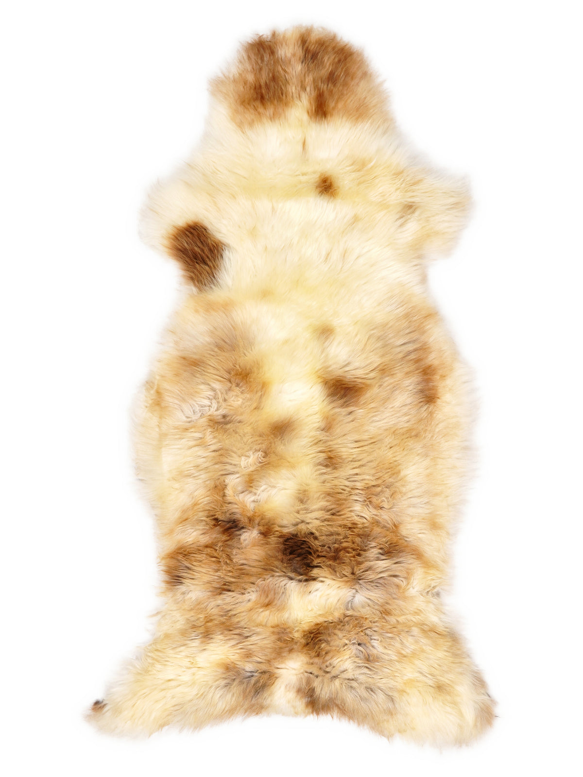 Mehrfarbiges britisches Lammfell, ca. 125 × 55 cm, von oben fotografiert: genau das Fell, das Sie erhalten